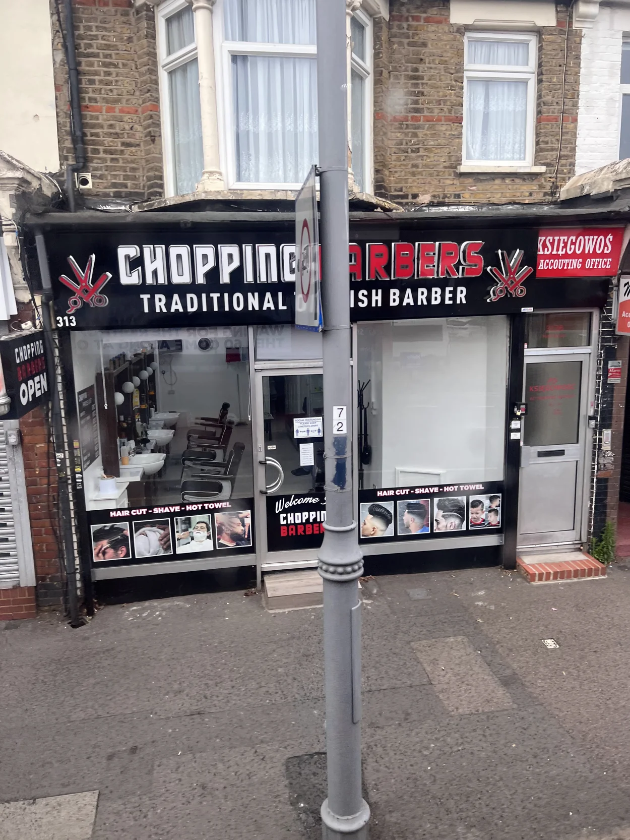 Chopping Barbers at 313 Hoe Street: the black CHOPPING BARBERS Traditional Turkish Barber fascia with red scissors logos, window decals reading Hair Cut - Shave - Hot Towel and rows of chairs inside