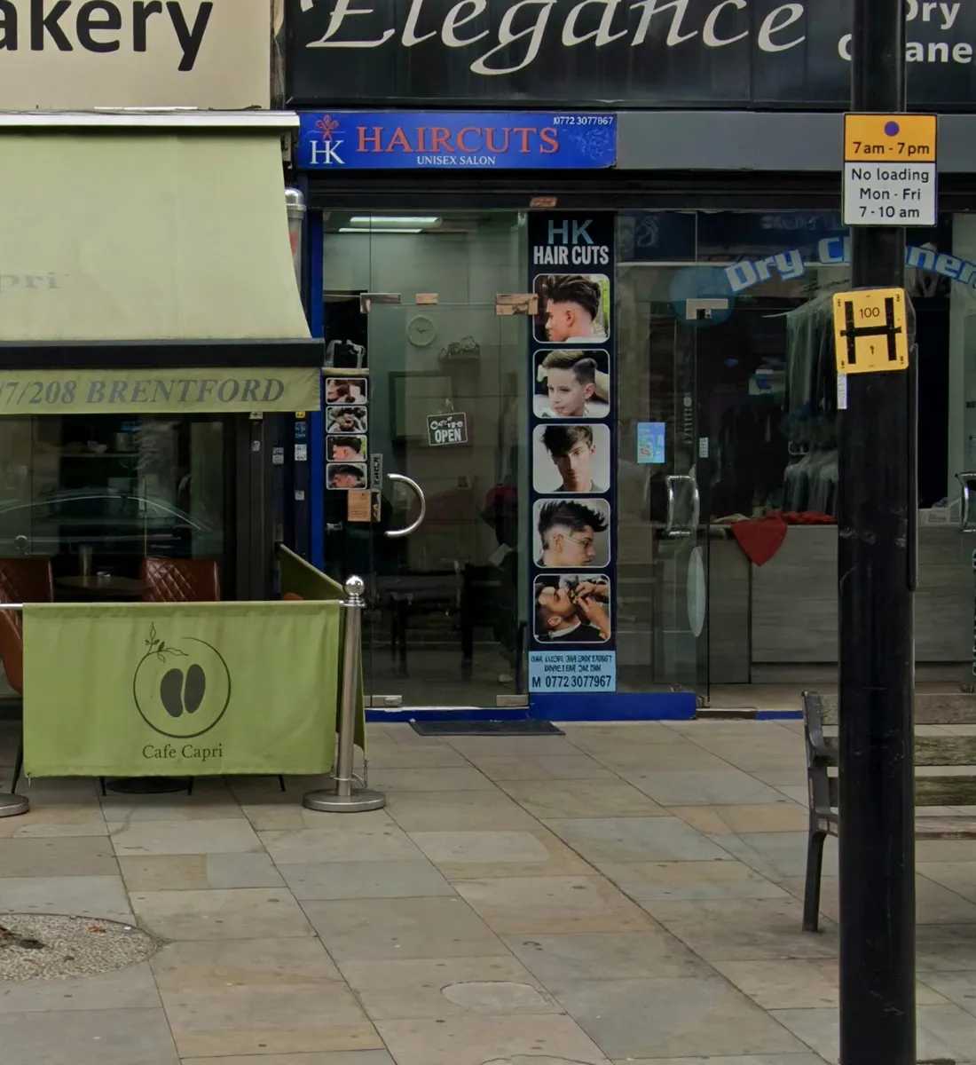 HK Haircuts shopfront with its blue sign on Brentford High Street
