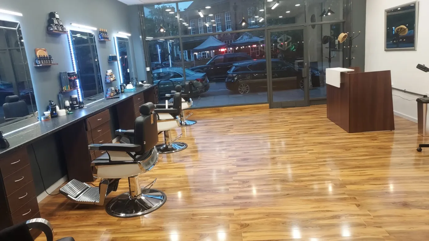 Inside Slim Barber — wood floors, LED mirrors and the glass frontage