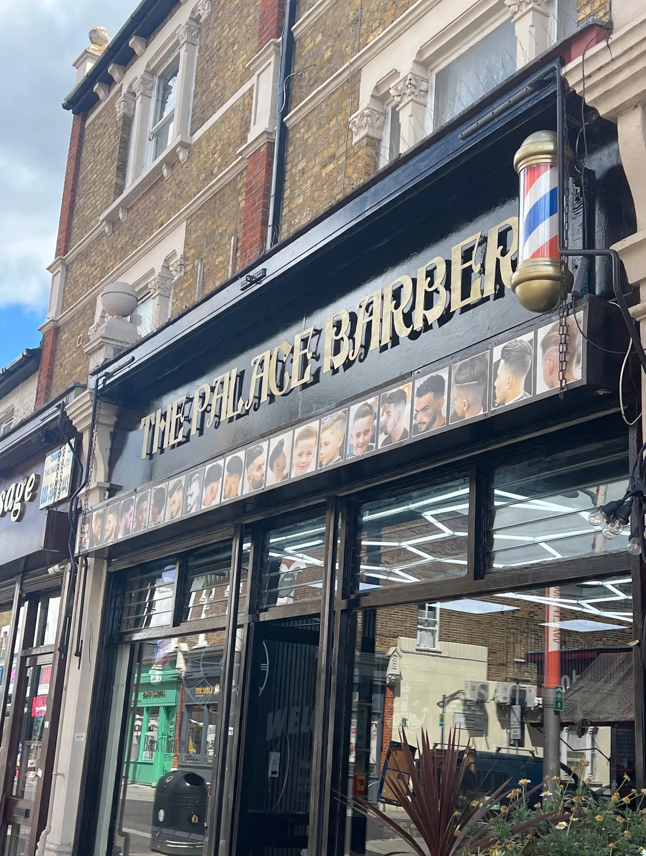 The Palace Barber shopfront on Walthamstow High Street — gold fascia lettering, a barber pole and a frieze of hairstyle photos