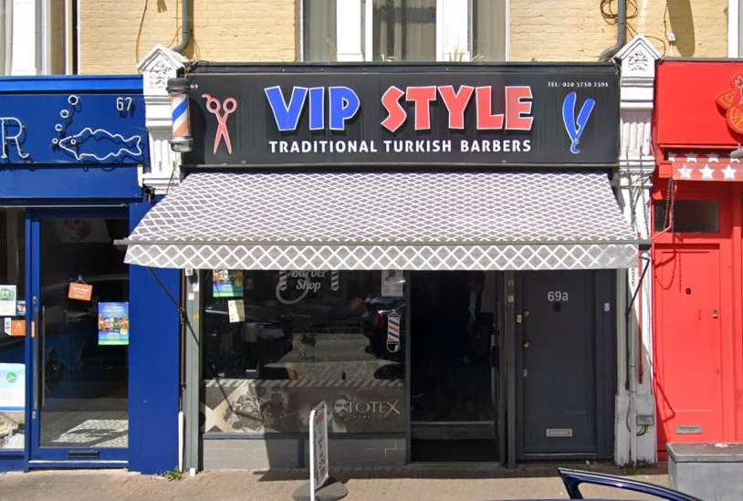 VIP Style Barbers at 69 Forest Road: the black VIP STYLE Traditional Turkish Barbers fascia with scissors and razor graphics, patterned awning and open glass frontage